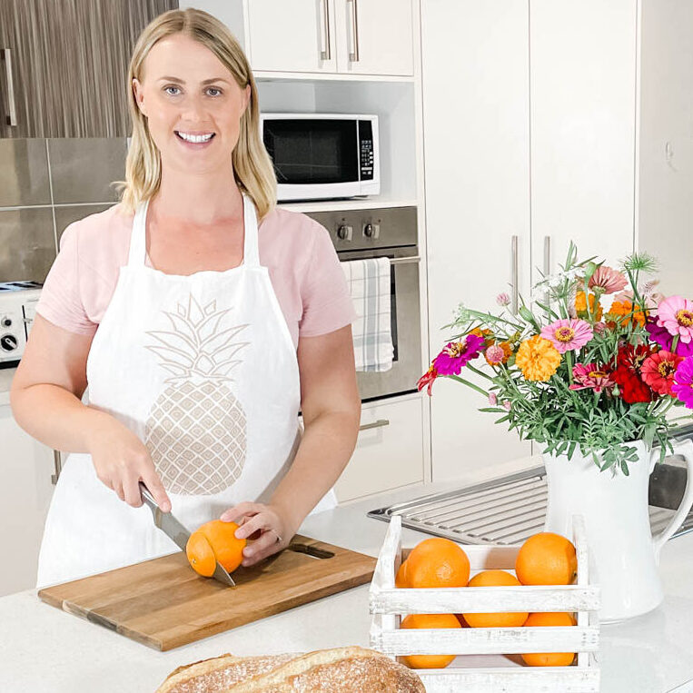 A head shot image of Emily from Pineapple Farmhouse