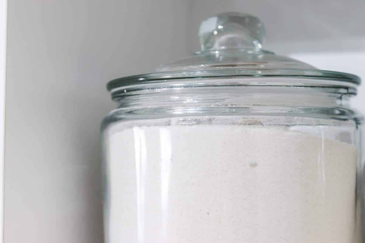 Kitchen-shelves-glass-jar-flour-close-up