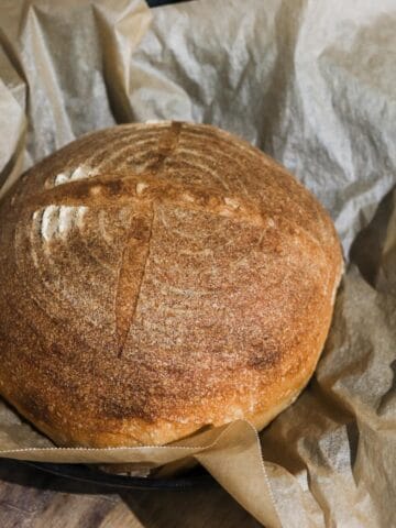 A loaf of freshly baked sourdough bread baked without a dutch oven