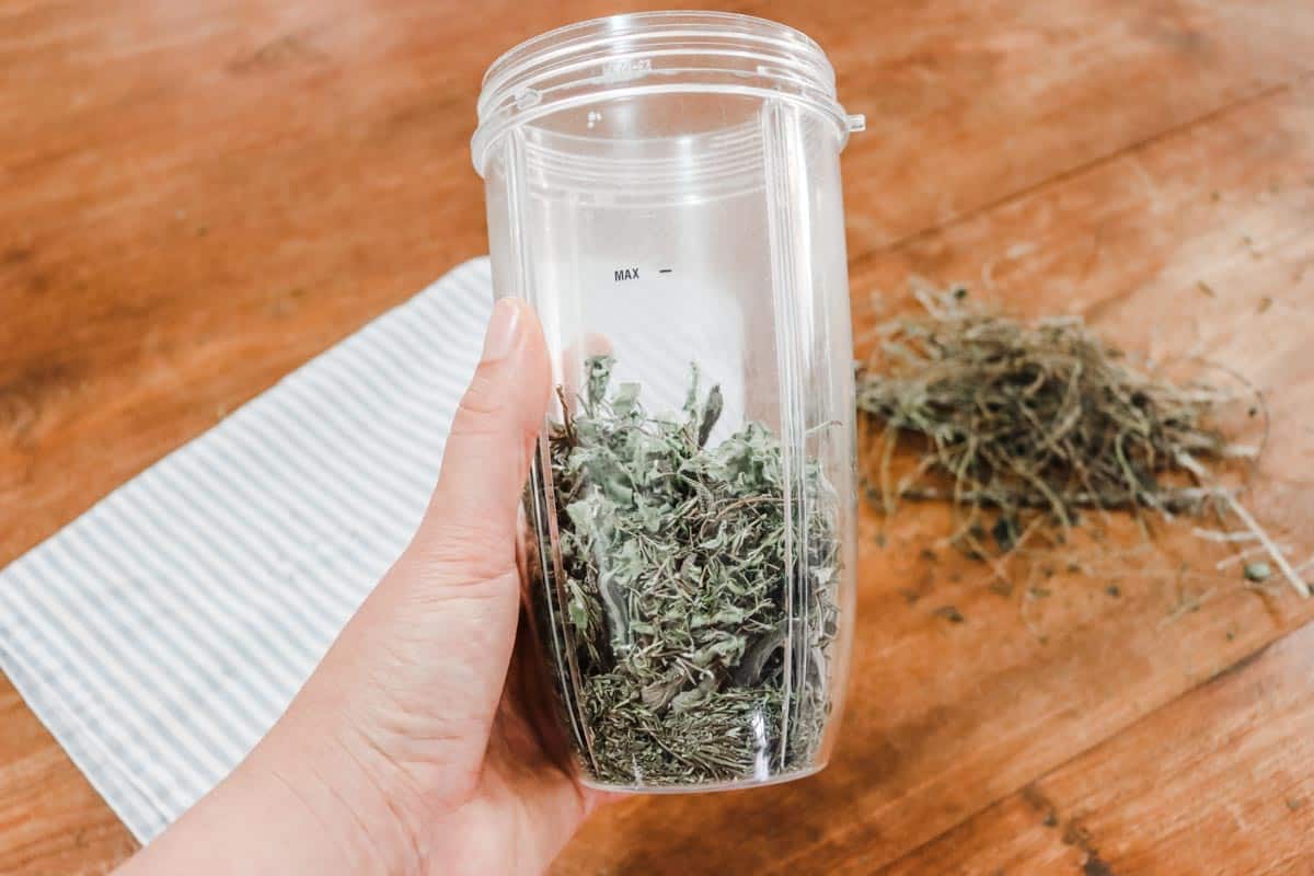 dried herbs in the blender cup