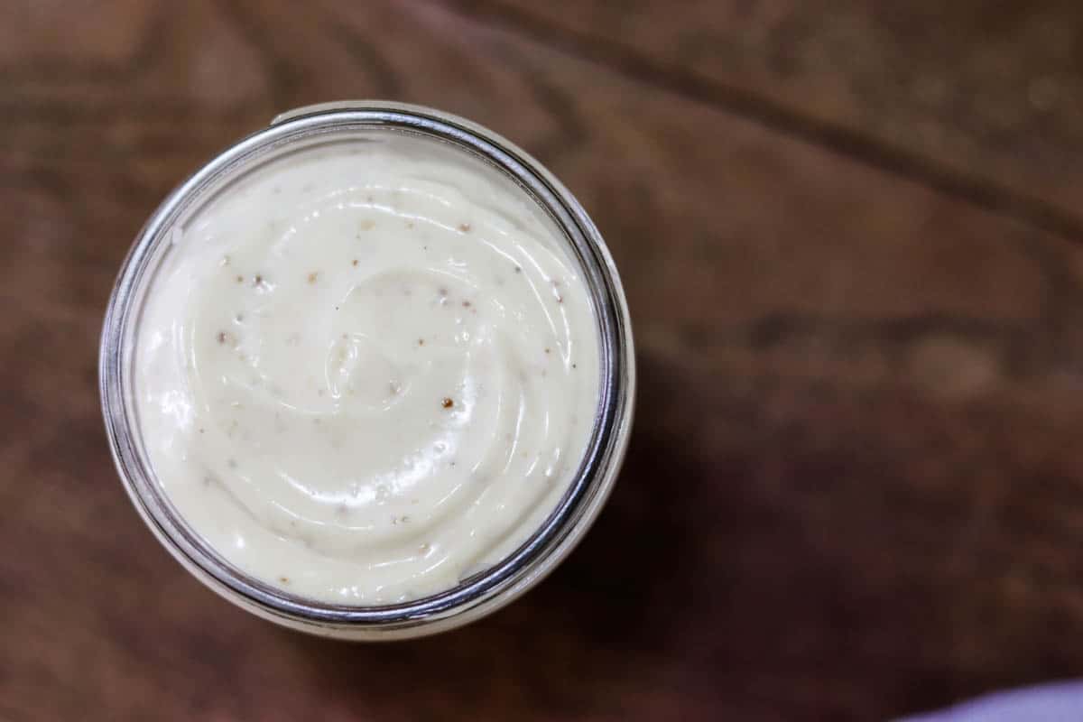 A jar full of homemade mayonnaise