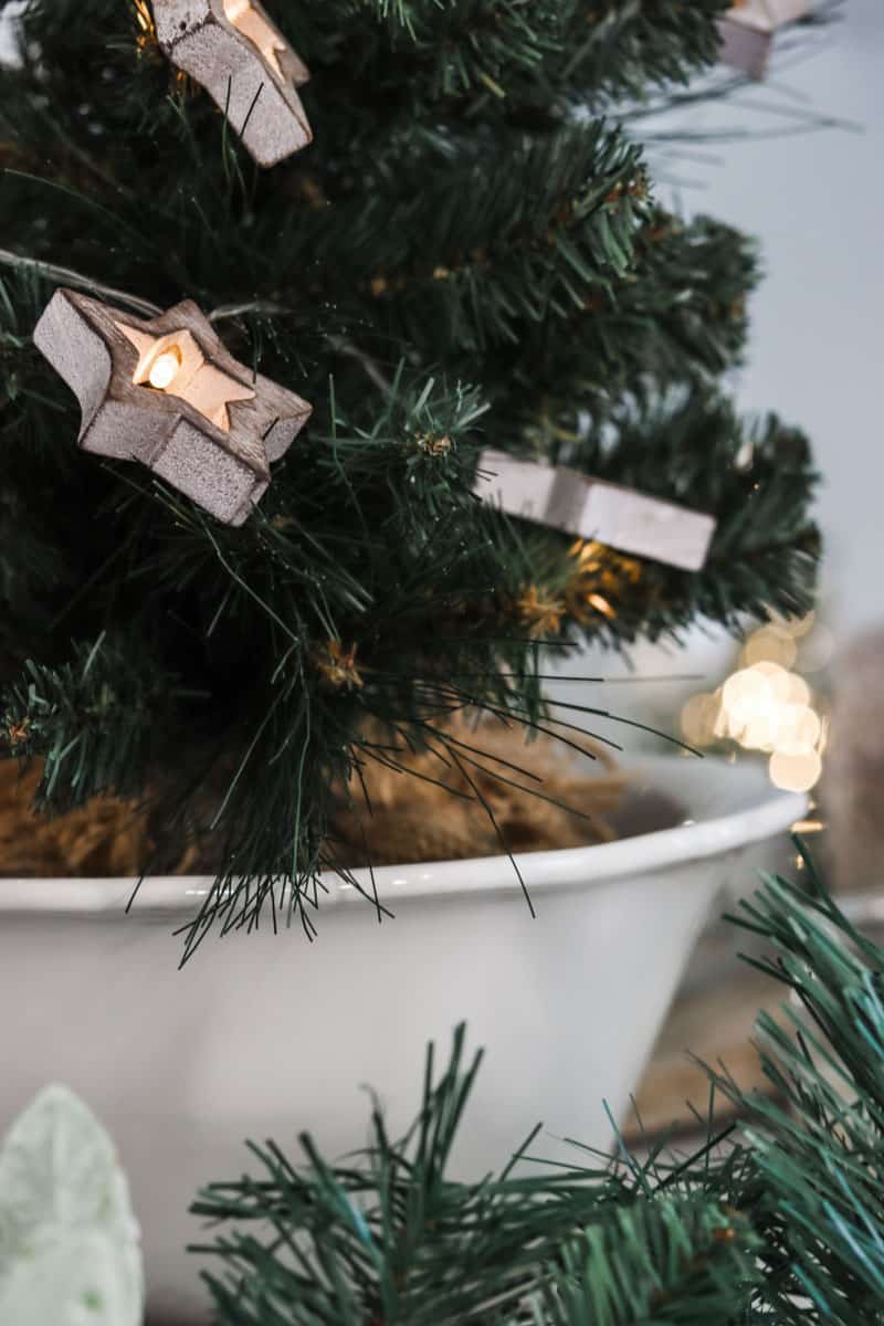 A small Christmas tree in a thrifted mixing bowl