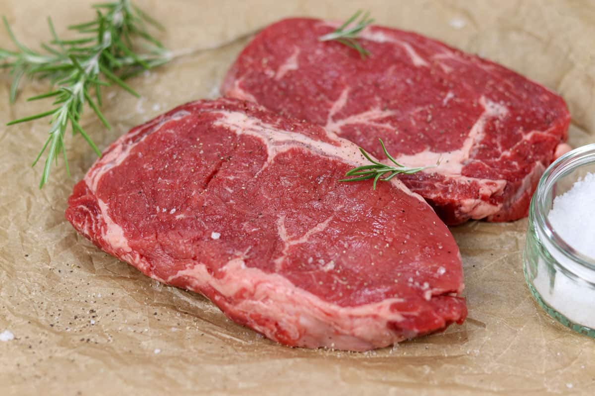 Two pieces of raw ribeye rib fillet steak