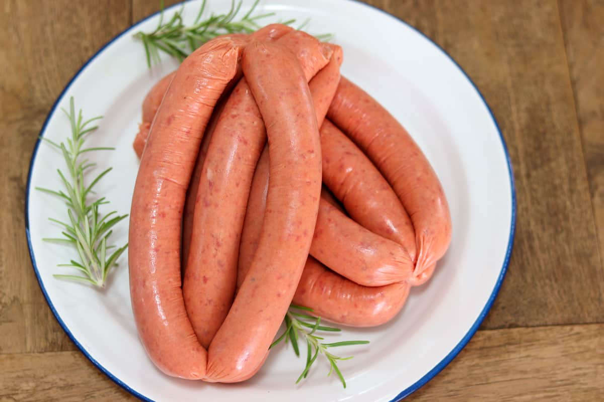 Fresh sausages on a plate