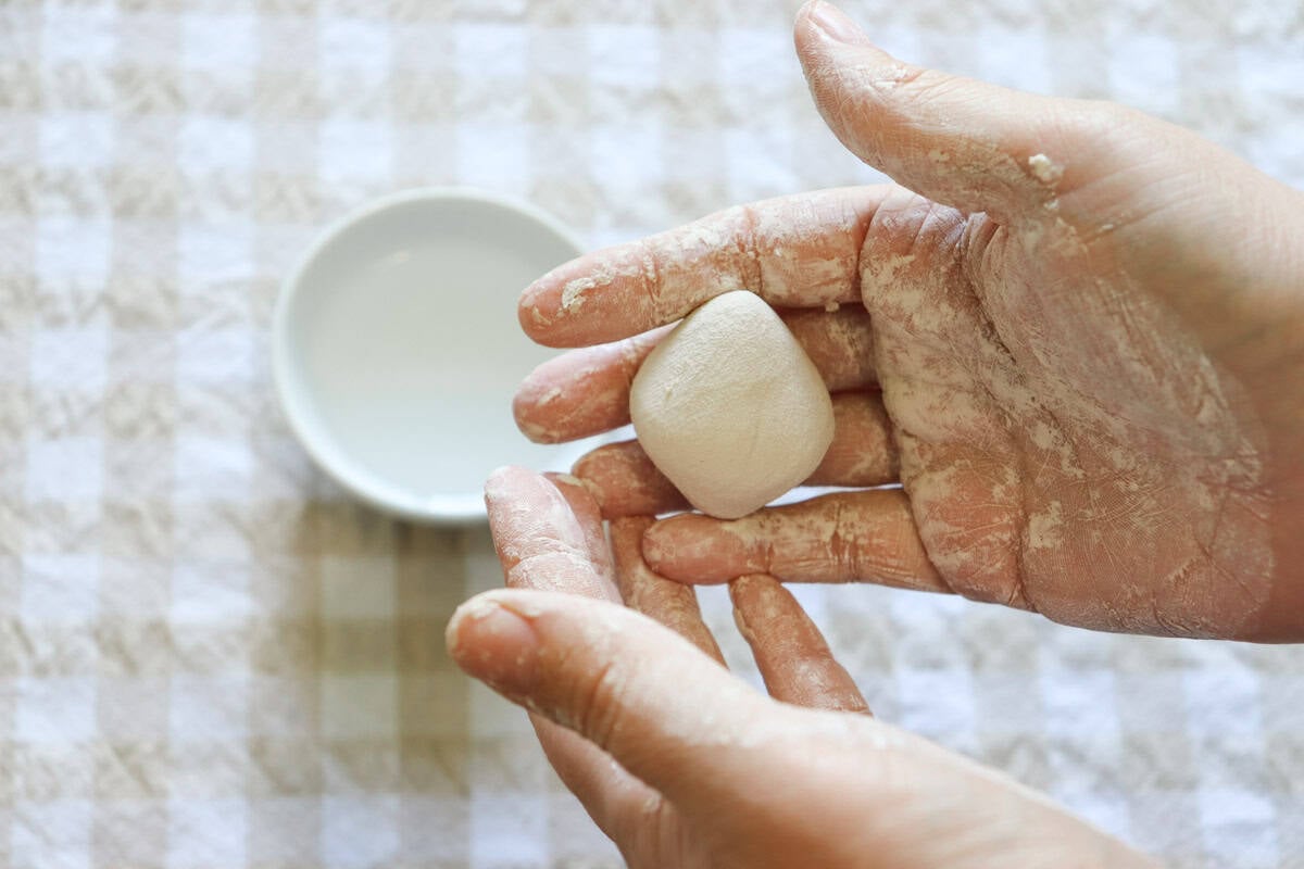 clay has been needed with water added and is ready to be pressed into the mould