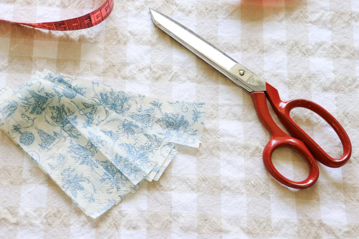 The strips of napkin are cut and ready to be applied