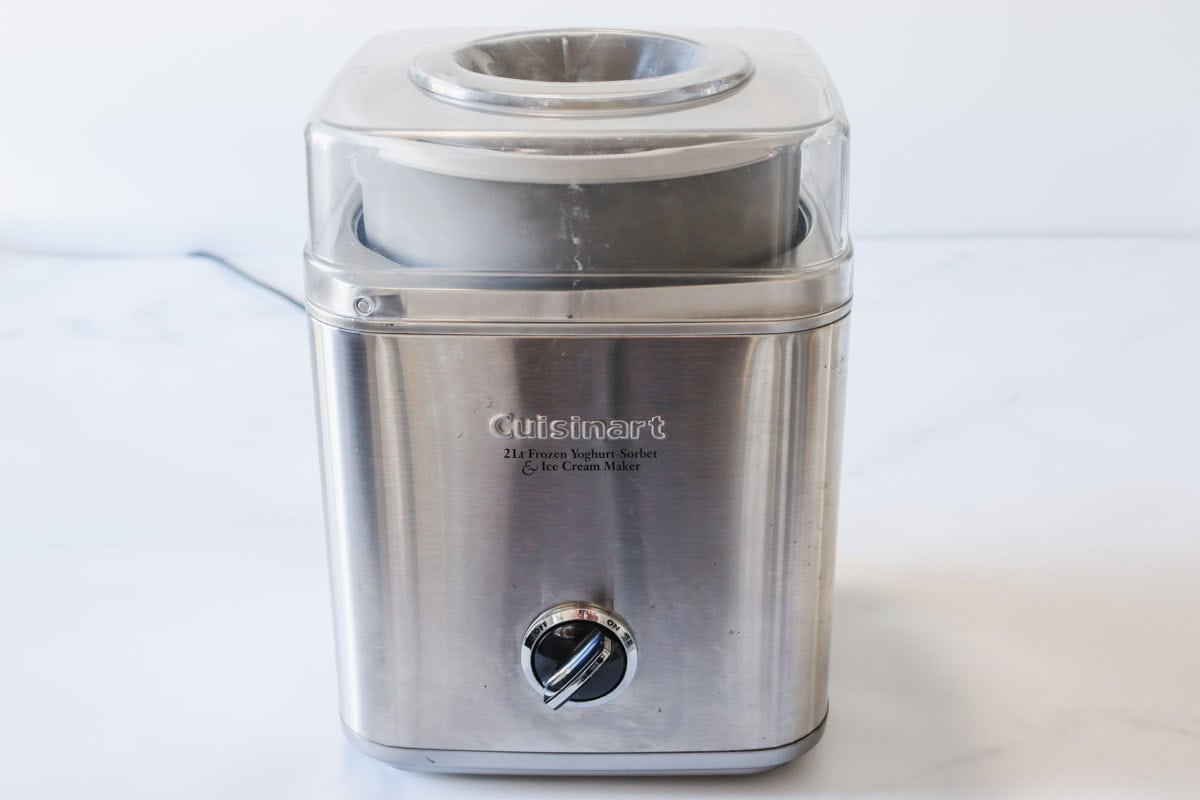 Ice cream is churning in the ice cream machine/maker