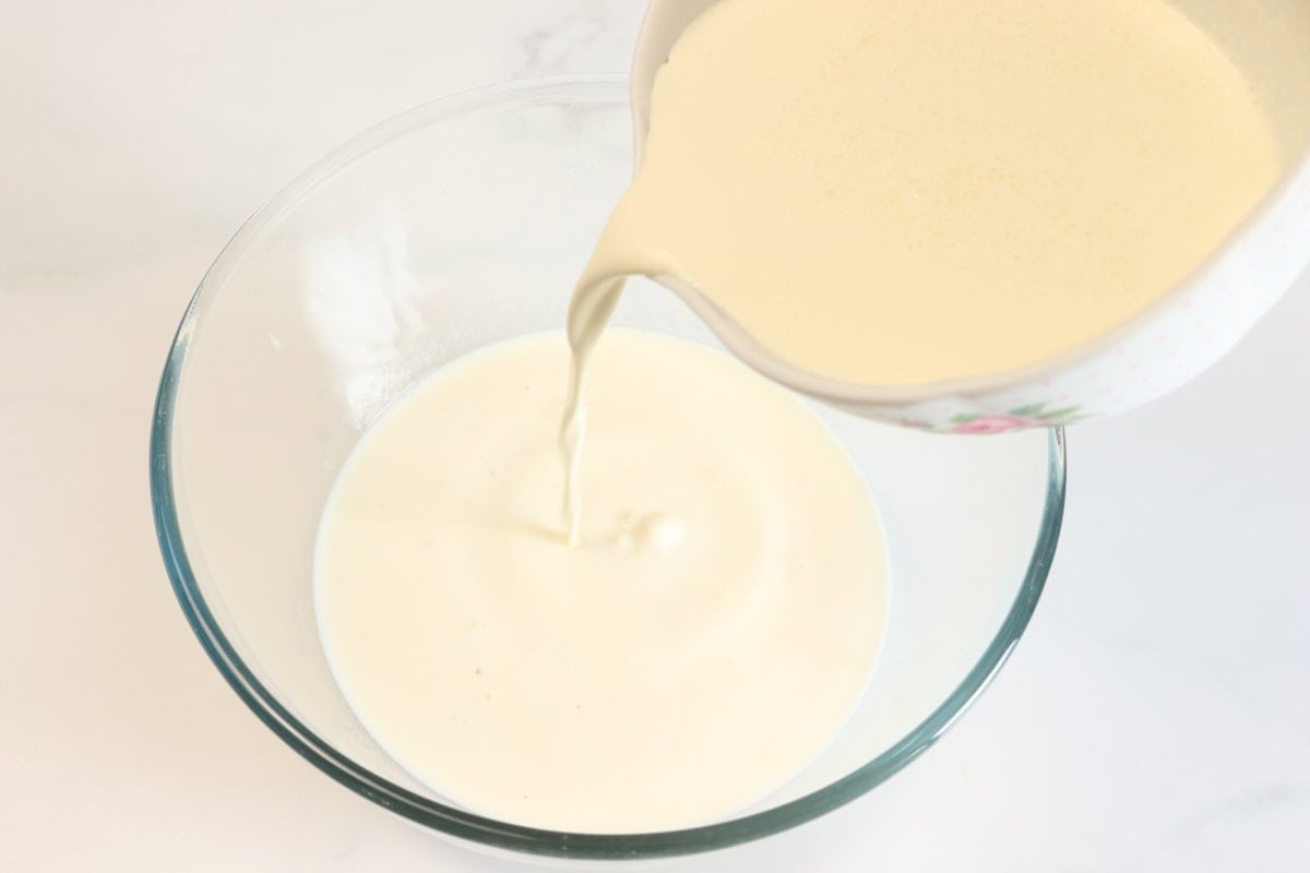 The cream, milk, vanilla extract and sugar is added to a mixing bowl