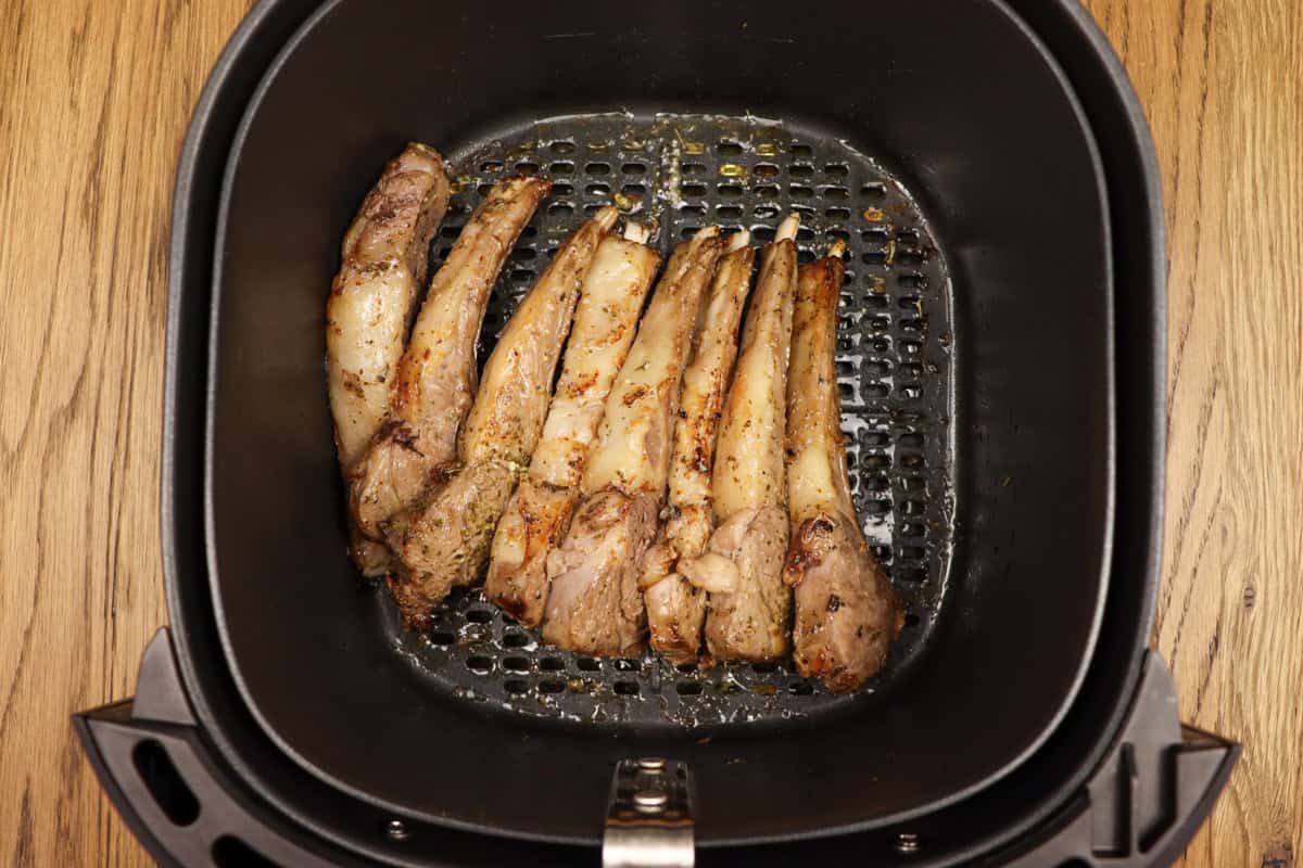 Lamb cutlets are turned and sit on their side with the fat caps facing upwards so the fat becomes crisp in the air fryer